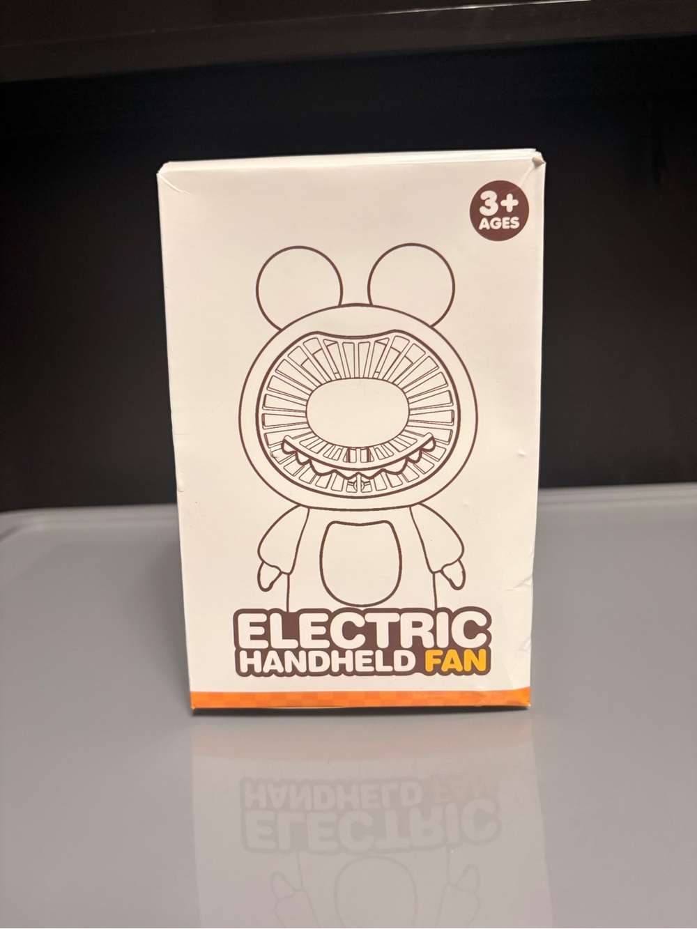 Electric Handheld Fan – White Box with Orange Accent